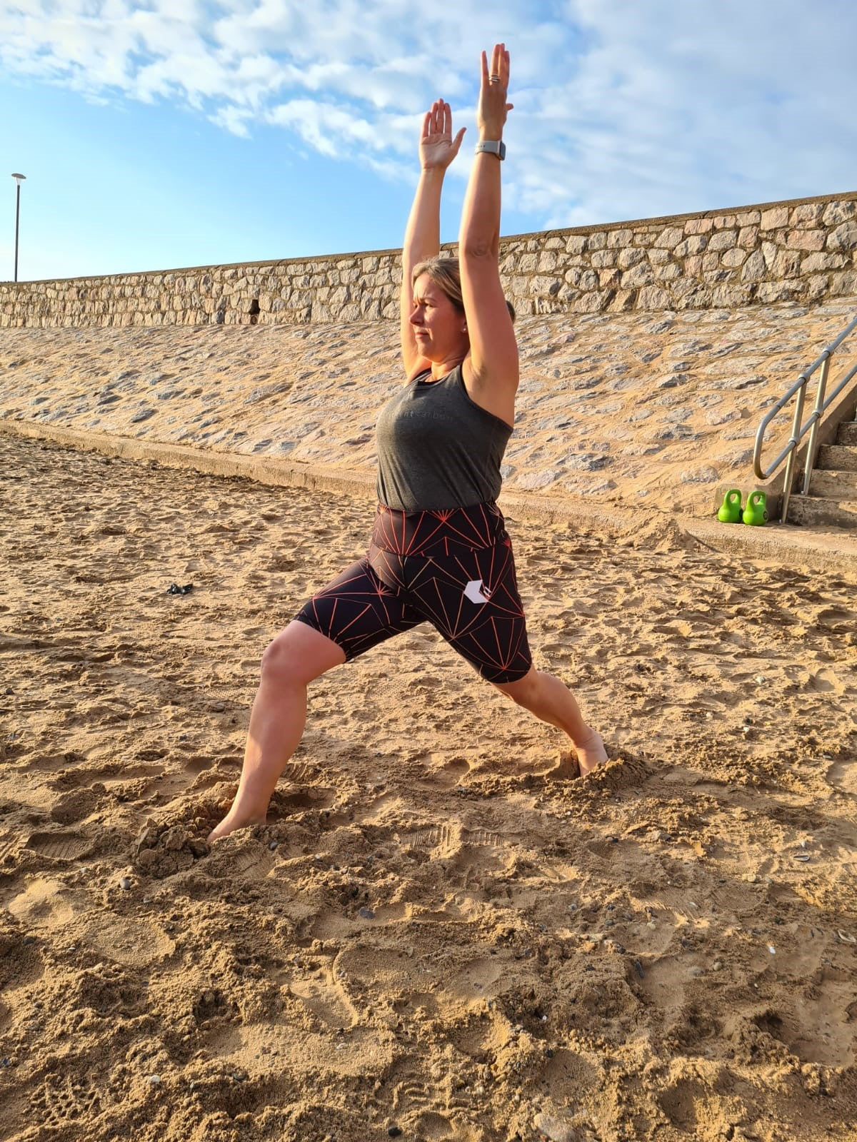Yoga on the beach in Framework shorts