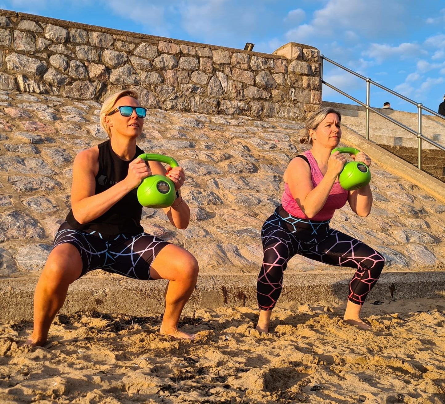 Kettlebell sessions on the beach in Strengthwork Shorts and Leggings
